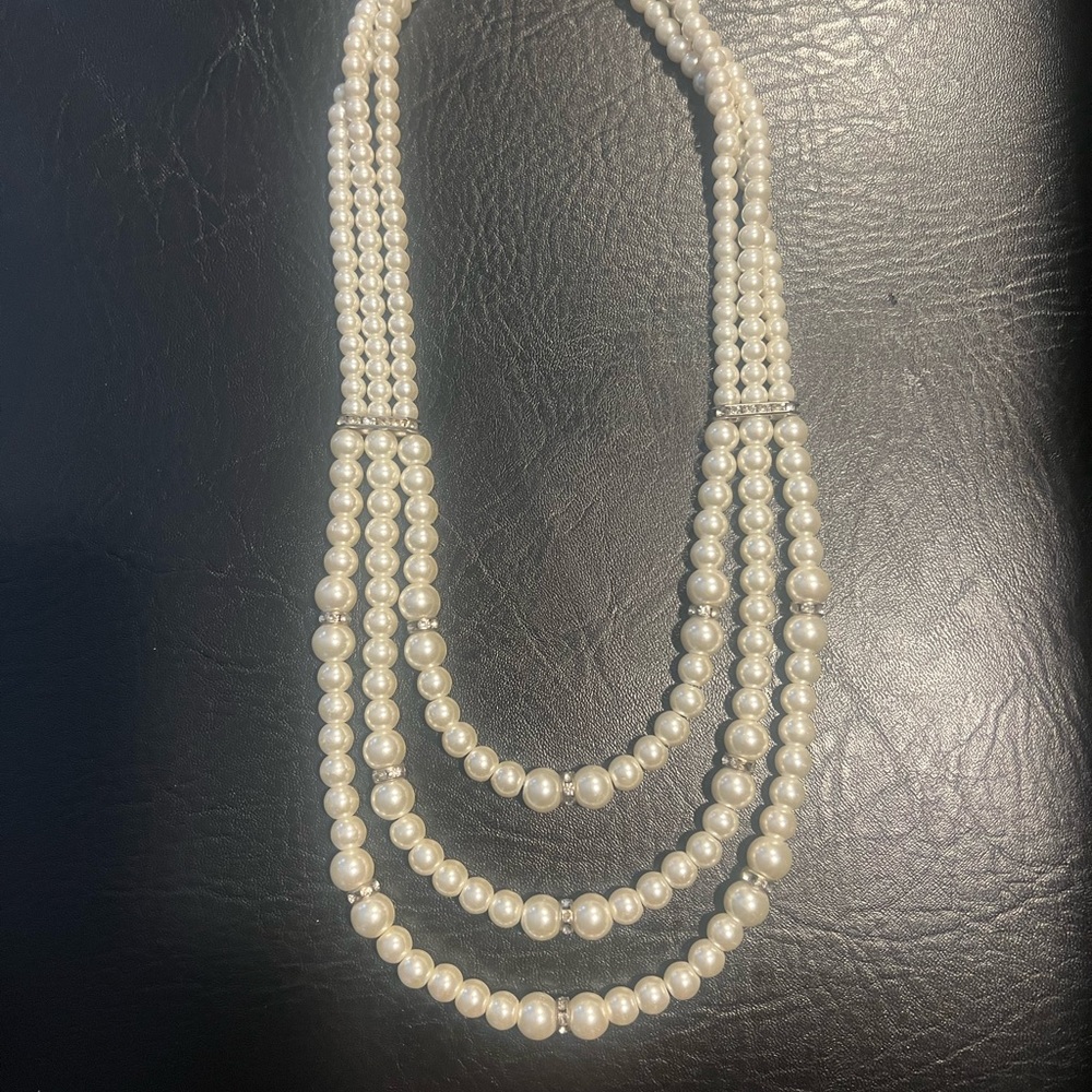Faux, three strand Pearl and crystal necklace.